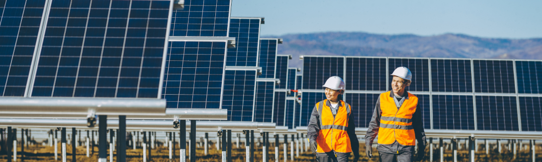 A man and woman at a solar facility
