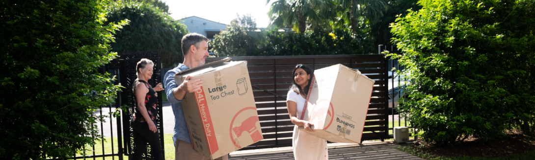 Couple with moving boxes